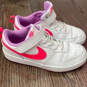 Little girls Nike shoes.